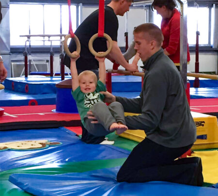 child on rings